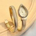 Goldene Schlangen-Armbanduhr mit Kristallen