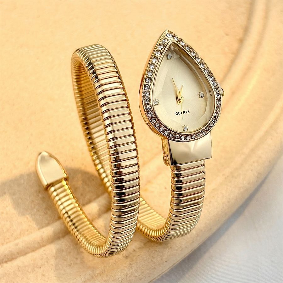 Goldene Schlangen-Armbanduhr mit Kristallen